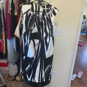 White and black Sheath dress.